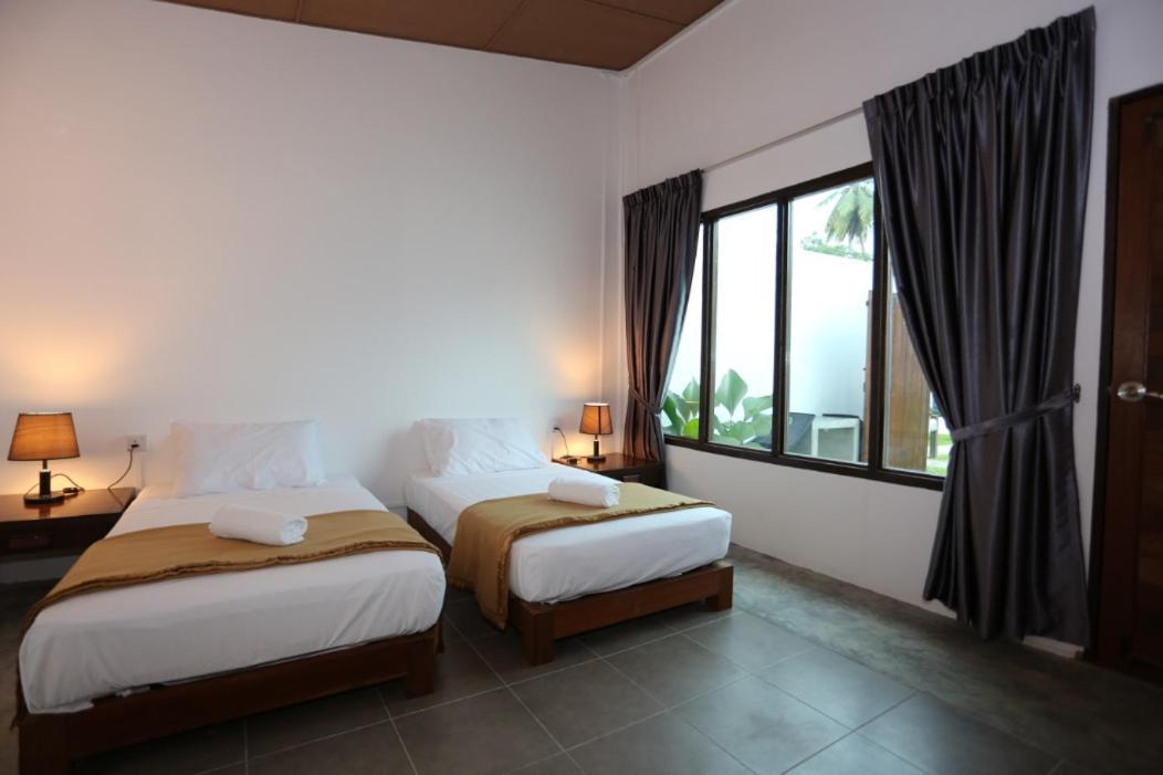 Rafflesia Resort Lundu Bagian luar foto